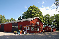 Vorschaubild: Kerstins Camping in Mellerud Rezeptionsanbau. Im Hintergrund: Sanitärgebäude